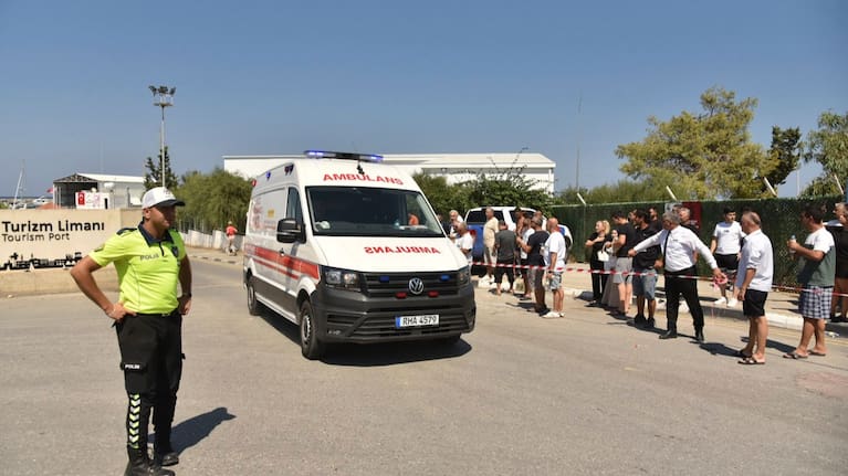 An ambulance arrives at the port of Kyrenia in the Turkish occupied northern part of Cyprus, Sunday, Aug. 30, 2026.