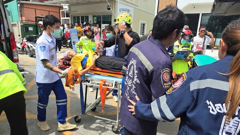 An injured is carried on a stretcher after a school shooting in Thailand's Nonthaburi province.