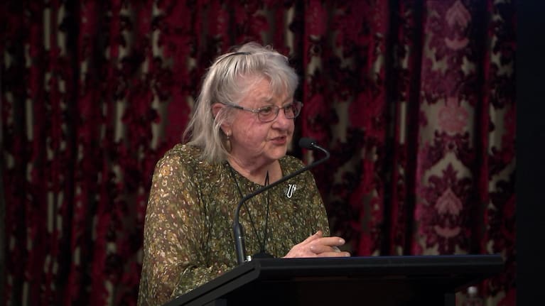 Glass sculptor Ann Robinson makes a speech as she accepts her Icon.