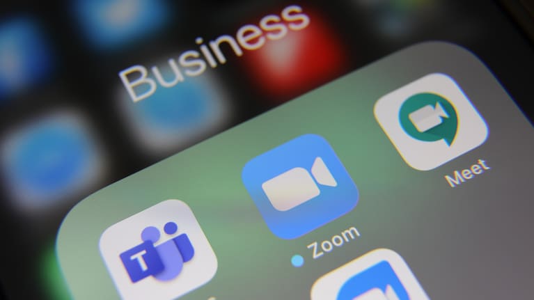 Apple iPhone 6s screen with video conference social media icons applications Zoom, Microsoft Teams, Meet, Skype, Telegram, Twitter etc.