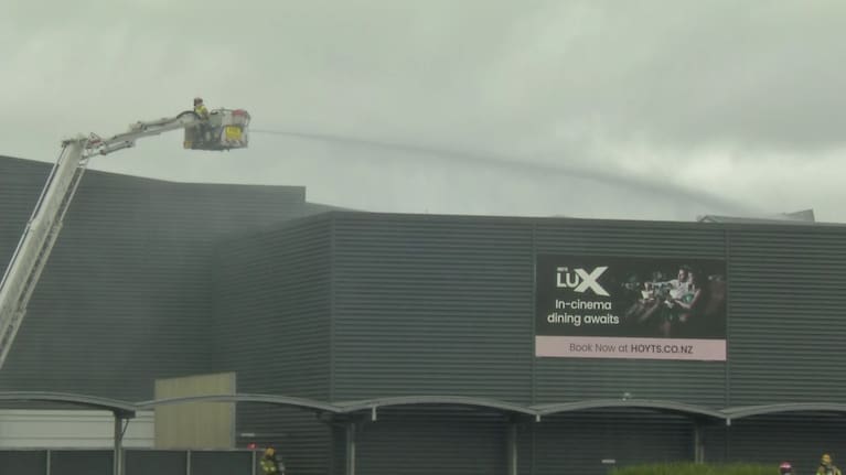 Crews could be seen directing water jets at part of the mall's buildings this morning. 