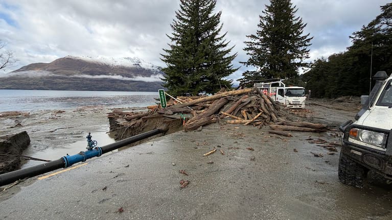 Crews work to clean up after flooding in Queenstown.