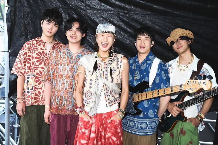 The members of sEODo Band pose backstage during the 2026 Korea Memorial Festa at Nanji Hangang Park in Seoul's Mapo District, June 7. The five-piece, known for blending pansori with rock, releases its first full-length album, 'ONE,' on Aug. 14. Courtesy of sEODo BAND 