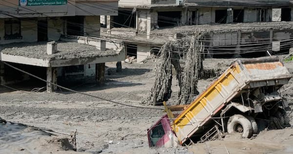Photos show scale of devastation, heartbreak after flash floods in Nepal, Tibet