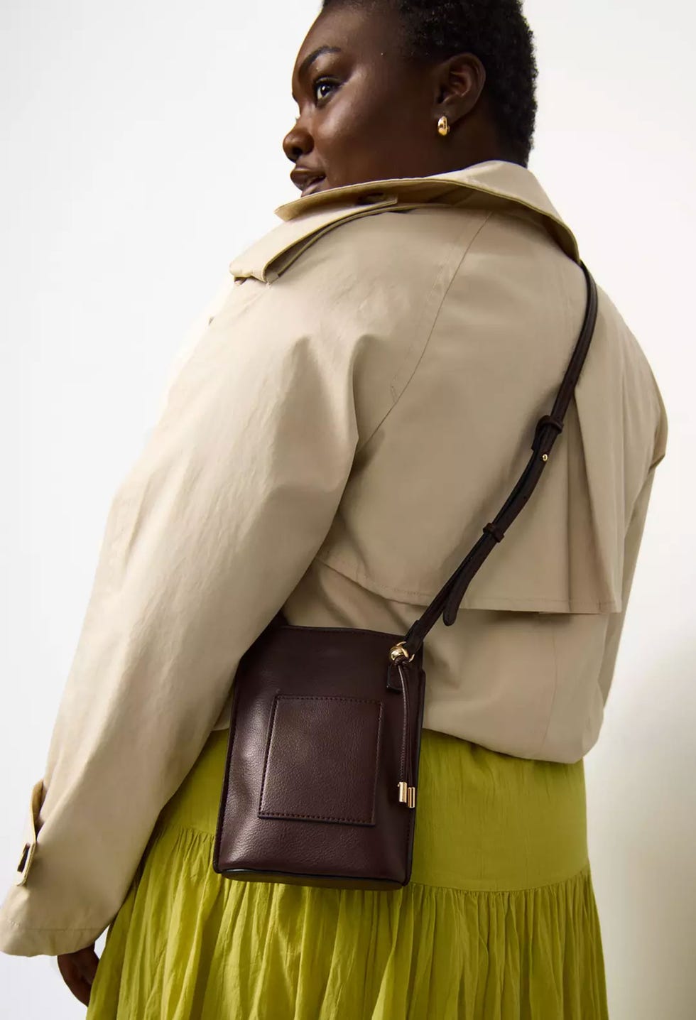 tu faux leather phone bag model wear tu's faux leather phone bag