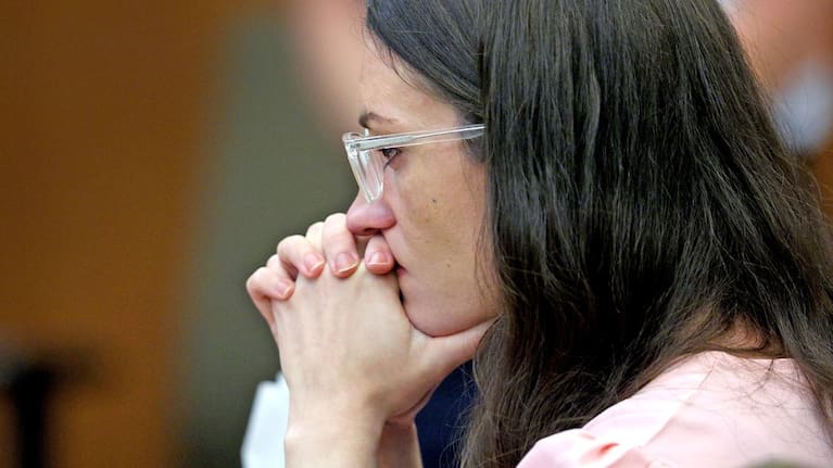 Defendant Lindsay Clancy listens to Dr Jennifer Tufts on the witness stand during her murder trial at Plymouth Superior Court in Plymouth, Massachusetts. (Source: Greg Derr/The Patriot Ledger via AP, Pool)