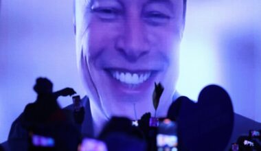 Tech billionaire Elon Musk speaks live via a video transmission during the election campaign launch rally of the far-right Alternative for Germany (AfD) political party on January 25, 2025 in Halle, Germany