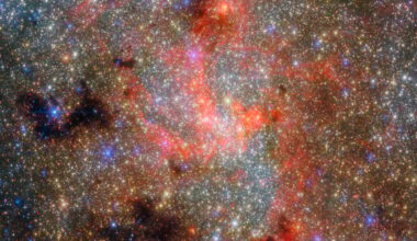NASA’s James Webb Space Telescope detected water molecules and freshly produced silicate dust around a dying star seen just 0.55 light-years in projection from the Milky Way’s central black hole—showing that surprisingly fragile material can form and survive within the Galaxy’s radiation-drenched central environment.