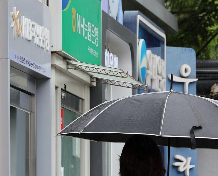ATM machines from local banks are seen in Seoul, Aug. 16. Yonhap   