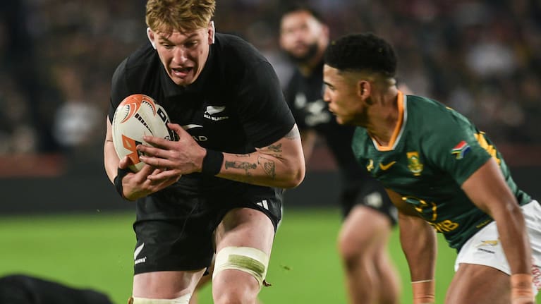 Fabian Holland on his way to scoring a try against the Springboks at Ellis Park.