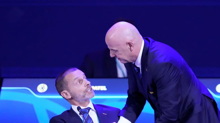 FIFA President Gianni Infantino, right, talks to UEFA President Aleksander Ceferin during the FIFA 75th Congress at the Conmebol Convention Center in Luque, Paraguay, Thursday, May 15, 2025.