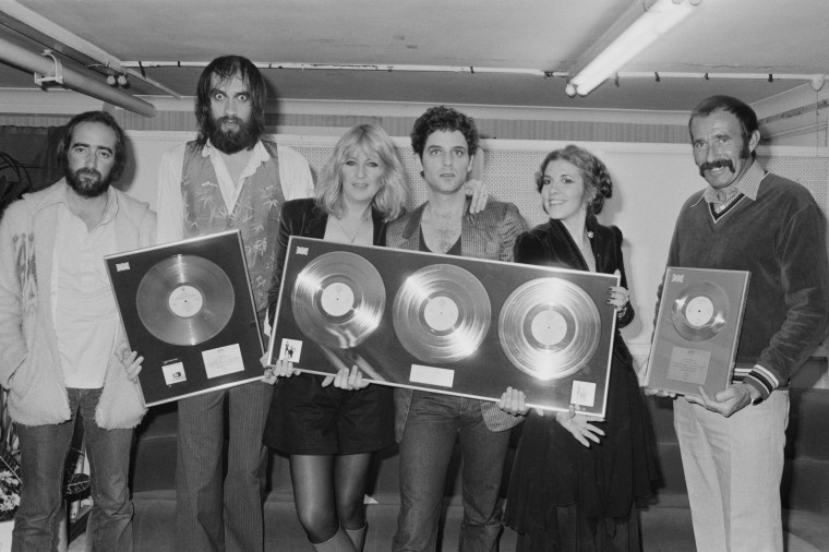 Fleetwood Mac with awards for British sales of their albums 'Rumours' and Tusk' at Wembley Arena in London in June 1980. Left to right: John McVie, Mick Fleetwood, Christine McVie, Lindsey Buckingham and Stevie Nicks. 