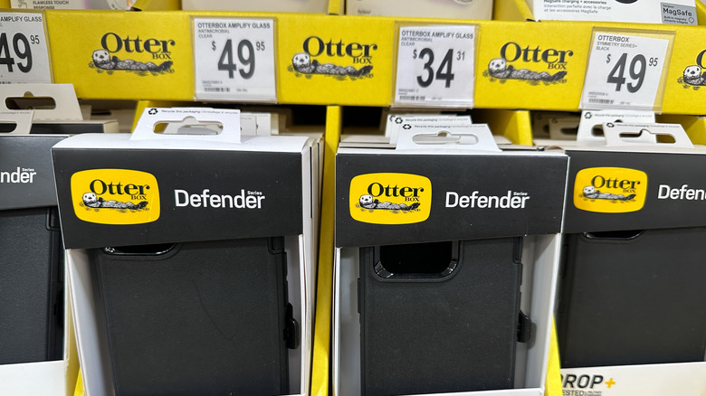 OtterBox smartphone cases on a display in a store