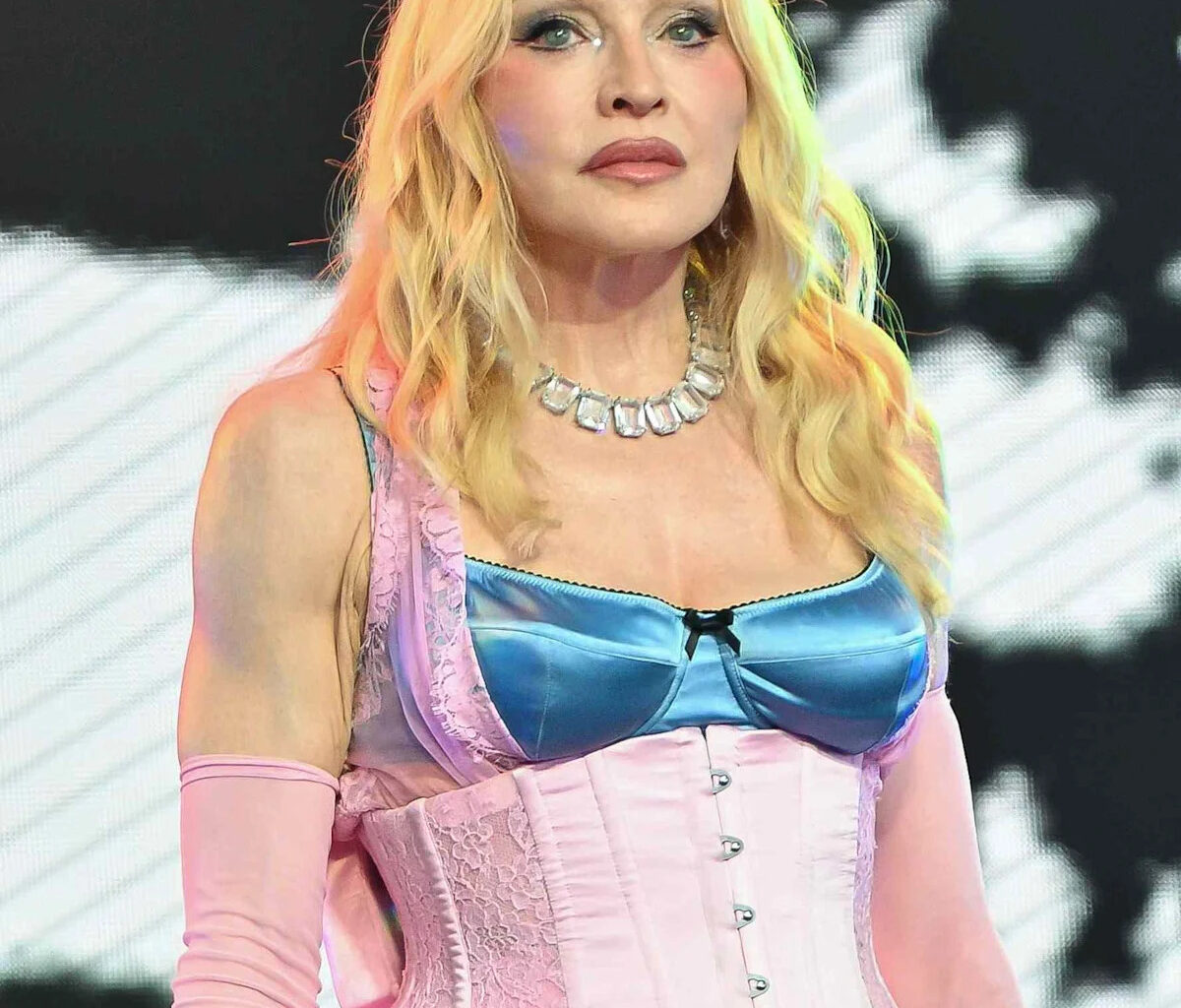 Madonna, 67, Wows in a Purple Silk Corset and Matching Bloomers for Amsterdam WorldPride Performance