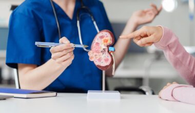 Kidney disease, Chronic kidney disease ckd, Female doctor explains the causes of the disease and treatment guidelines on kidney model to female asian patient at desk at urology hospital room.
