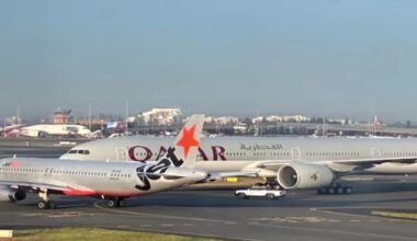 Two planes have near-miss at Sydney Airport, crew member injured
