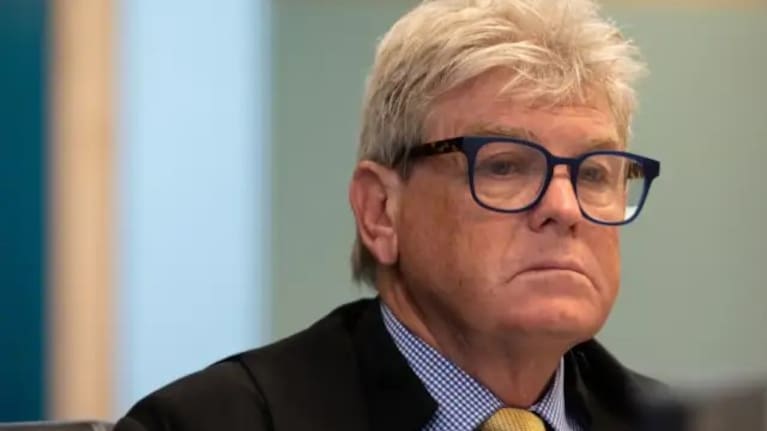 Justice Simon Moore KC.