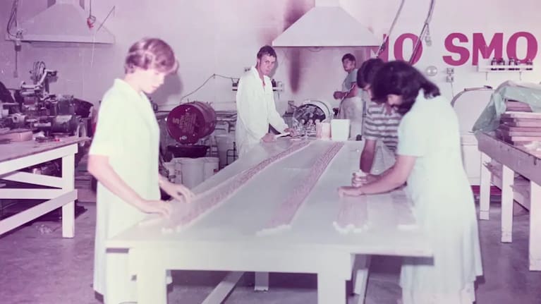 Lollies from Horners were mostly made by hand in 1984. Vina Bhikha, Dhiru's wife, is on the right.