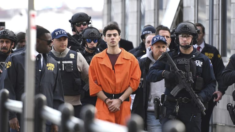 Luigi Mangione, a suspect in the fatal shooting of UnitedHealthcare CEO Brian Thompson, is escorted by police in New York.