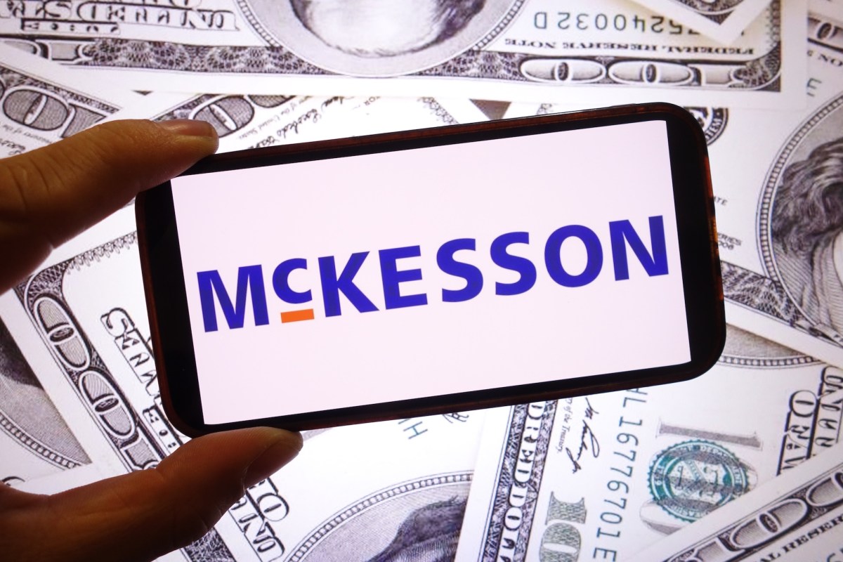 mckesson logo on a background featuring cash notes