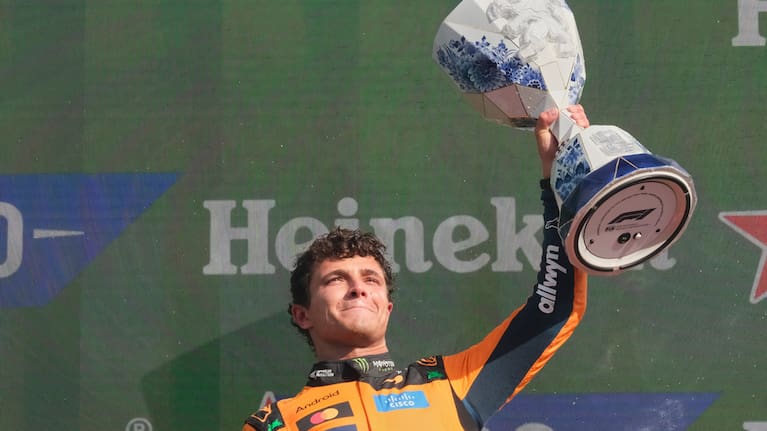 McLaren driver Lando Norris of Britain holds the trophy after winning the Formula One Dutch Grand Prix in Zandvoort , Netherlands.
