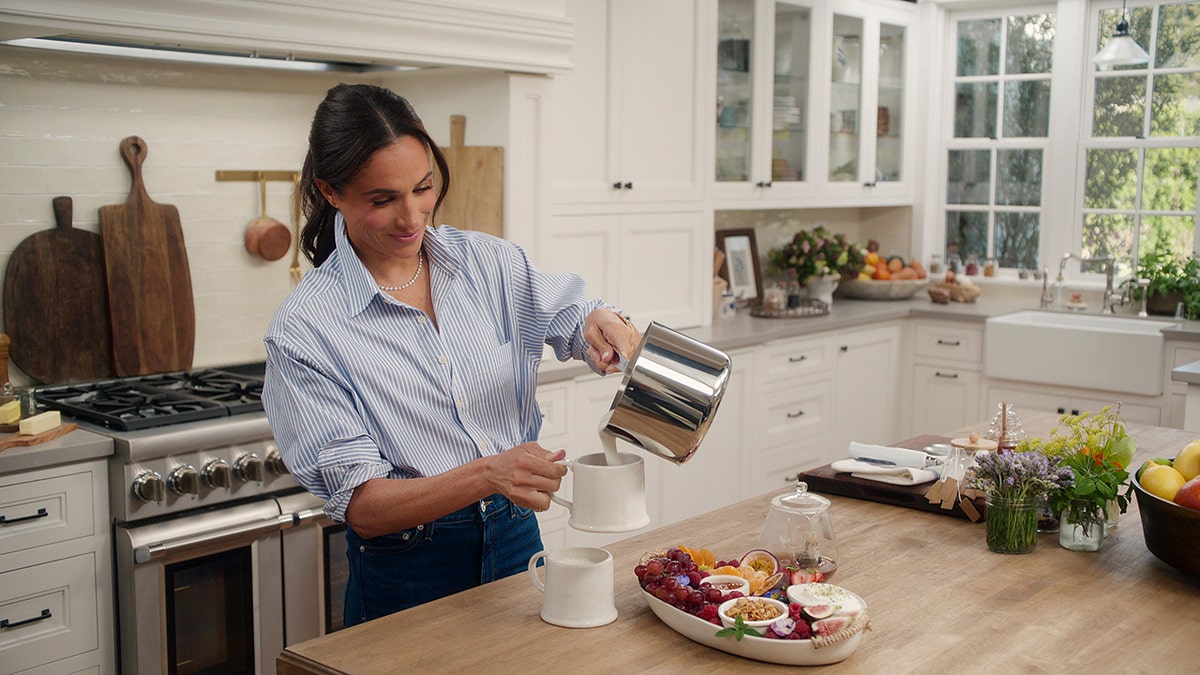 Meghan Markle cooking in a Montecito kitchen.