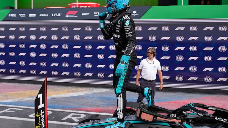 Mercedes driver George Russell of Britain reacts after taking pole position after the sprint qualifying for the Formula One Dutch Grand Prix in Zandvoort , Netherlands.