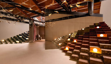 former textile warehouse transforms into fractal-inspired jaipur rugs showroom in mumbai