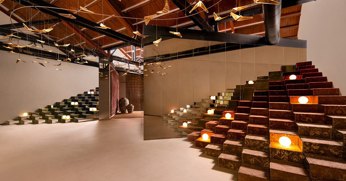 former textile warehouse transforms into fractal-inspired jaipur rugs showroom in mumbai