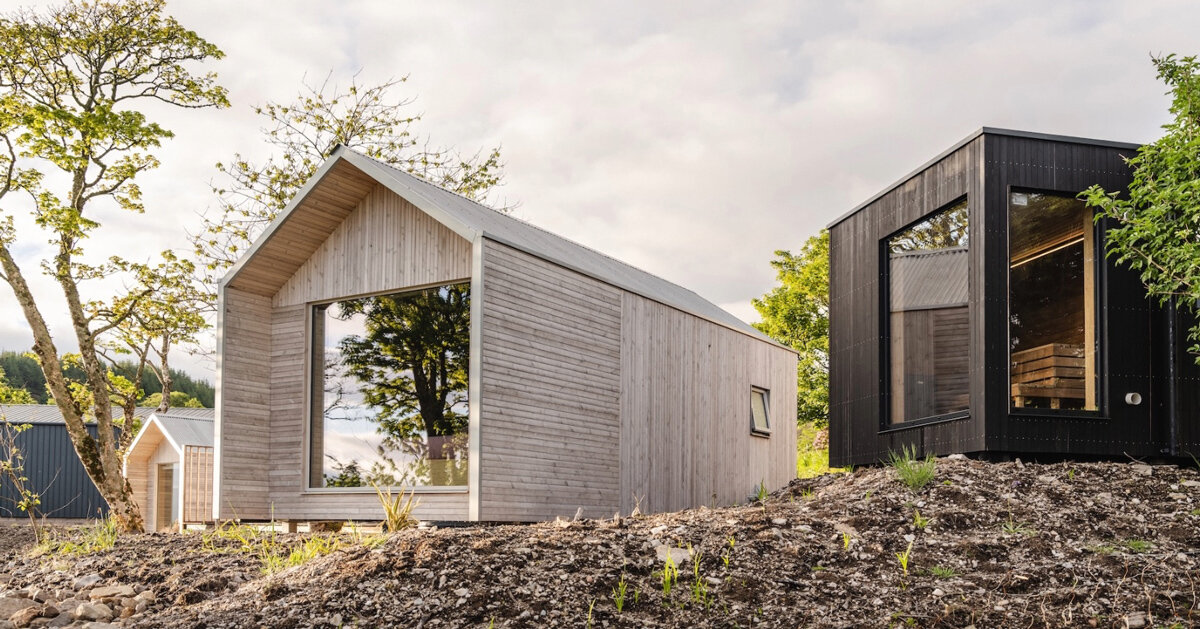 gabled timber cabins by córr nestle into scotland’s rugged landscape