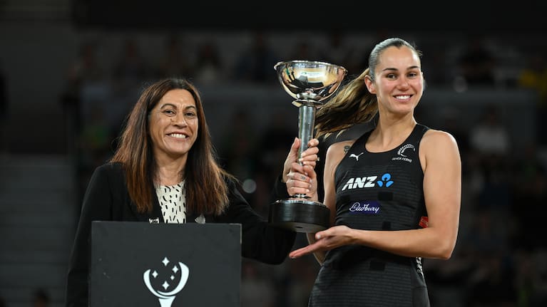 New Zealand head coach, Dame Noeline Taurua (left) and Ameliaranne Ekenasio of New Zealand hold up the trophy after winning the Constellation Cup series in 2024.