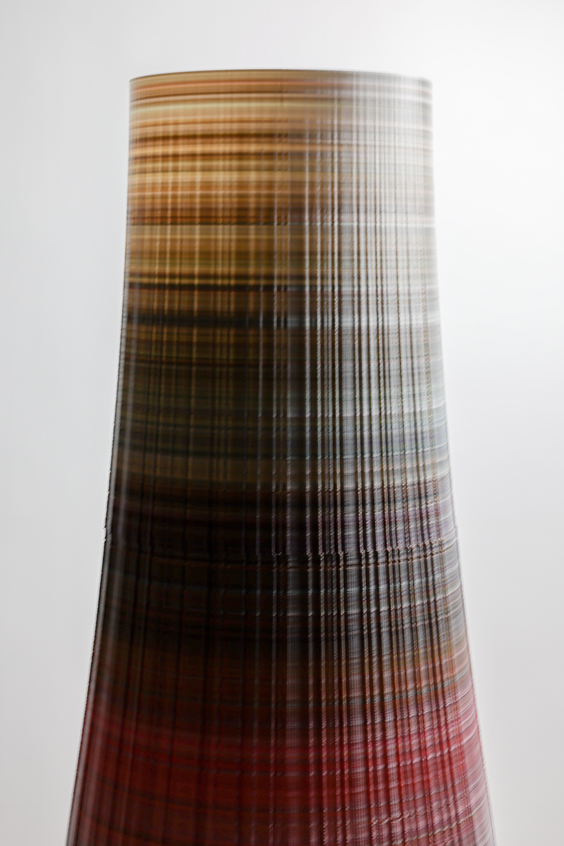 ninefold transforms discarded plastic into an immersive field of sound light and architecture 4