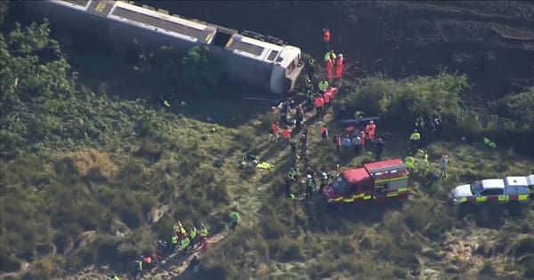 Passenger train derails after carriages overturn in southern England