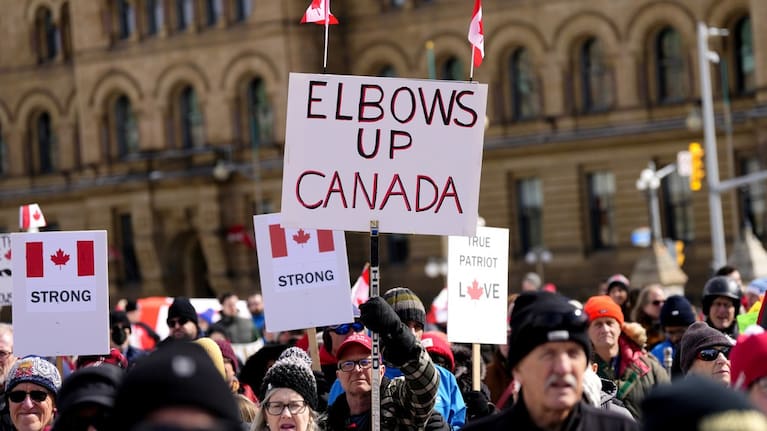 People rally in response to US President Donald Trump's threats to Canadian sovereignty on Parliament Hill in Ottawa, March 9, 2025.