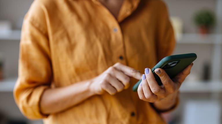 A person using their cell phone (file photo).