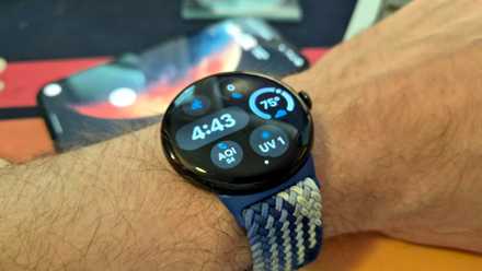 Pixel Watch with Pixel phone in background