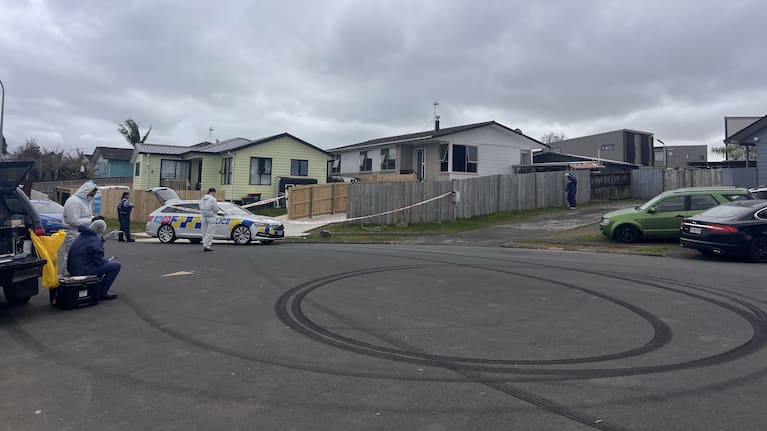 Police at the scene of a double fatal incident on Gambare Pl.