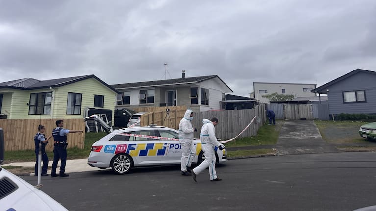 Police at the scene of a double fatal incident on Gambare Pl.