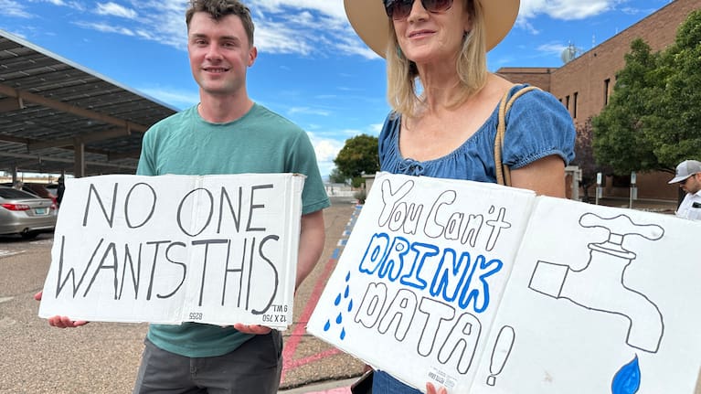 Jacob Weinreich and his mother Sharon Metcalf protest the Project Jupiter data centre.