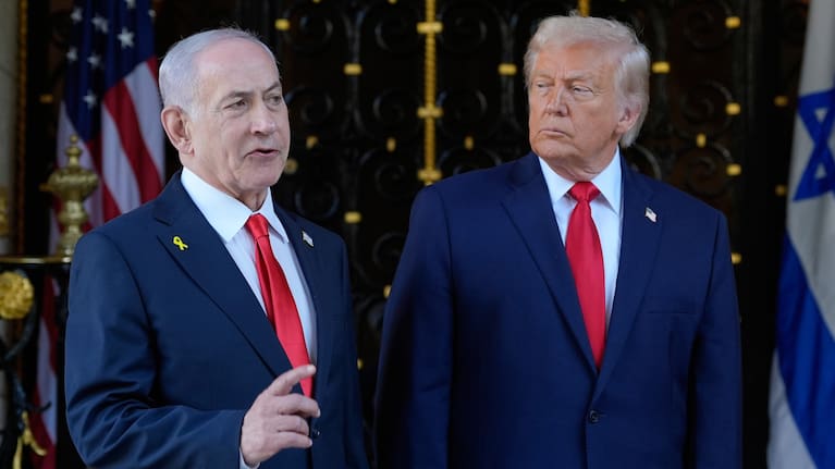 President Donald Trump listens as Israel's Prime Minister Benjamin Netanyahu speaks at President Donald Trump's Mar-a-Lago club, December 29, 2025, in Palm Beach, Florida.