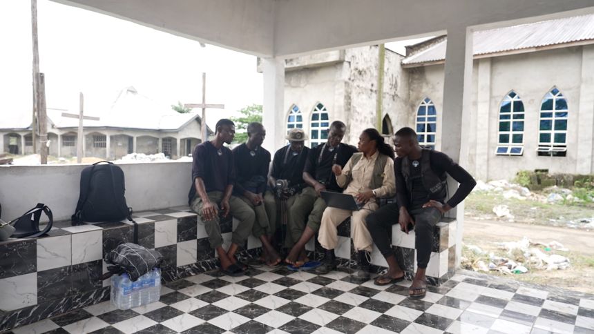 Rachel Ikemeh in a meeting with rangers in Foropa Middleton Kingdom.