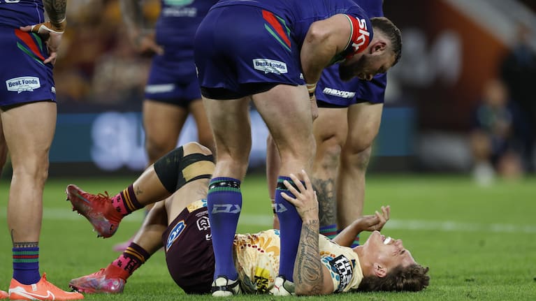 Reece Walsh of the Broncos lies injured during the round 24 NRL match between Brisbane Broncos and New Zealand Warriors at Suncorp Stadium.