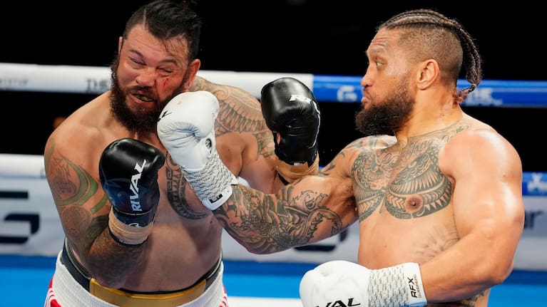Rene Ranger wears a powerful right hand from Manu Vatuvei during his first-round defeat.