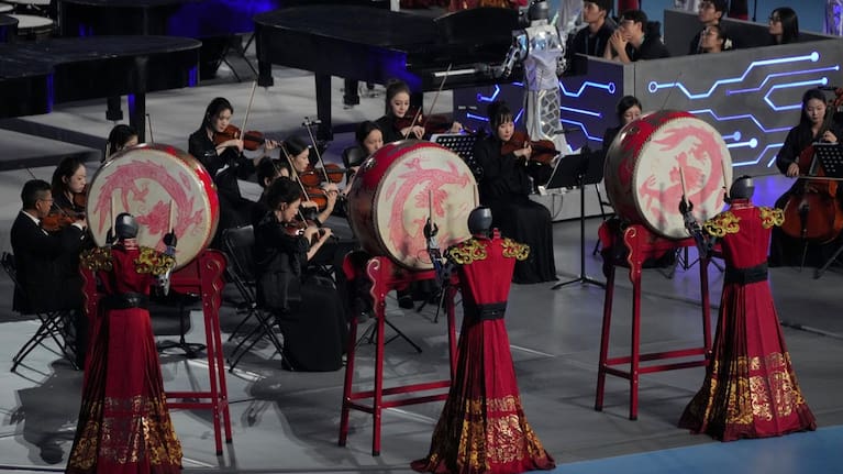 Robots perform with drum during the opening ceremony of the World Humanoid Robot Games in Beijing, Saturday, August 22, 2026.