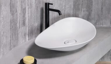 Roca’s New Bathtub and Basin Turn Recycled PET Bottles Into Sculptural Bathroom Design