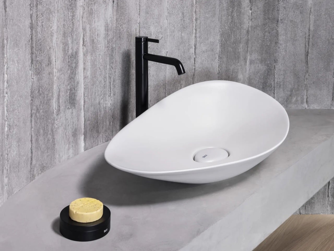 Roca’s New Bathtub and Basin Turn Recycled PET Bottles Into Sculptural Bathroom Design