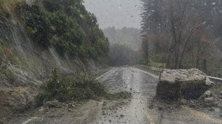 Rocks fall onto State Highway 35.