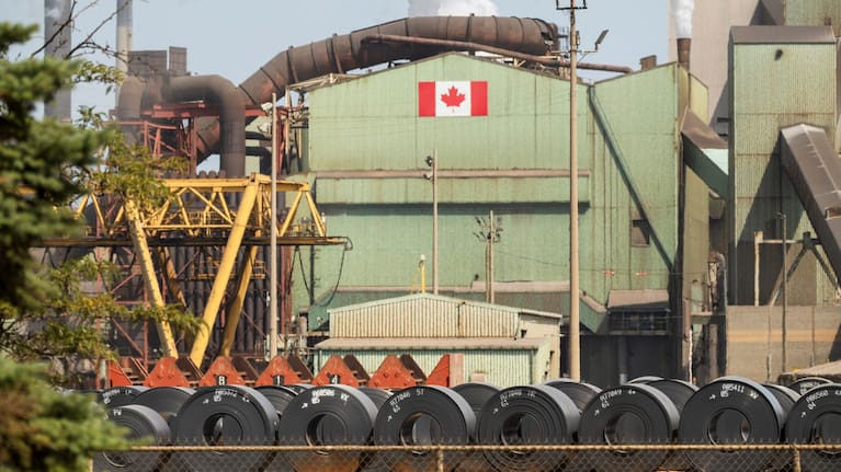 Rolled coils of steel sit in the yard at the ArcelorMittal Dofasco steel plant in Hamilton, Ontario on Thursday, August 20, 2026.