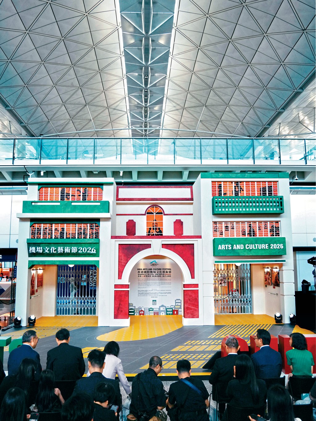 The architectural installation blends tong lau and shikumen building styles. The architectural installation blends tong lau and shikumen building styles.