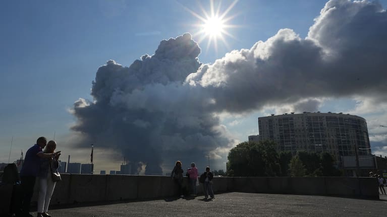 Smoke billows into the sky following Ukrainian drone strikes on warehouses of Russia's online retailer Wildberries, in St Petersburg.